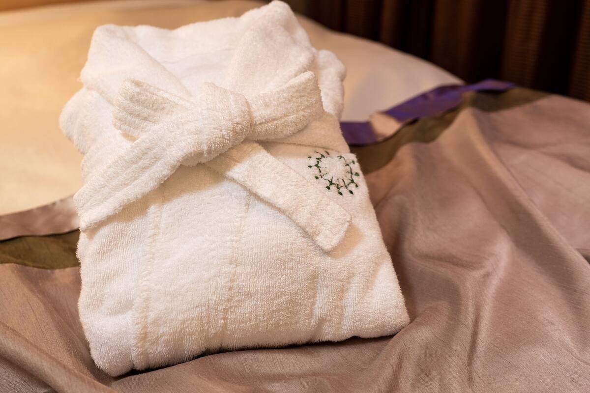 1 bedroom, premium bedding, blackout curtains, iron/ironing board