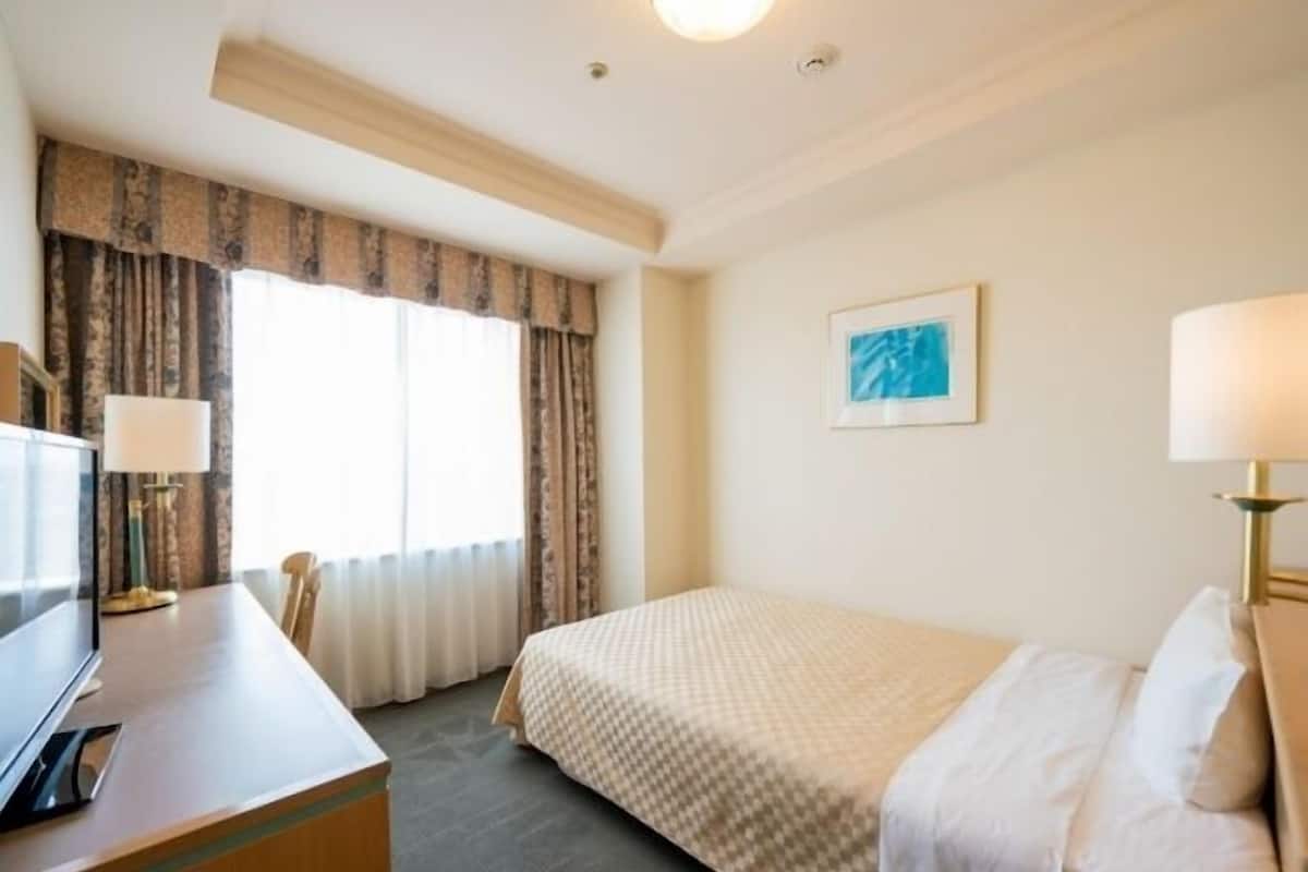 1 bedroom, premium bedding, blackout curtains, iron/ironing board
