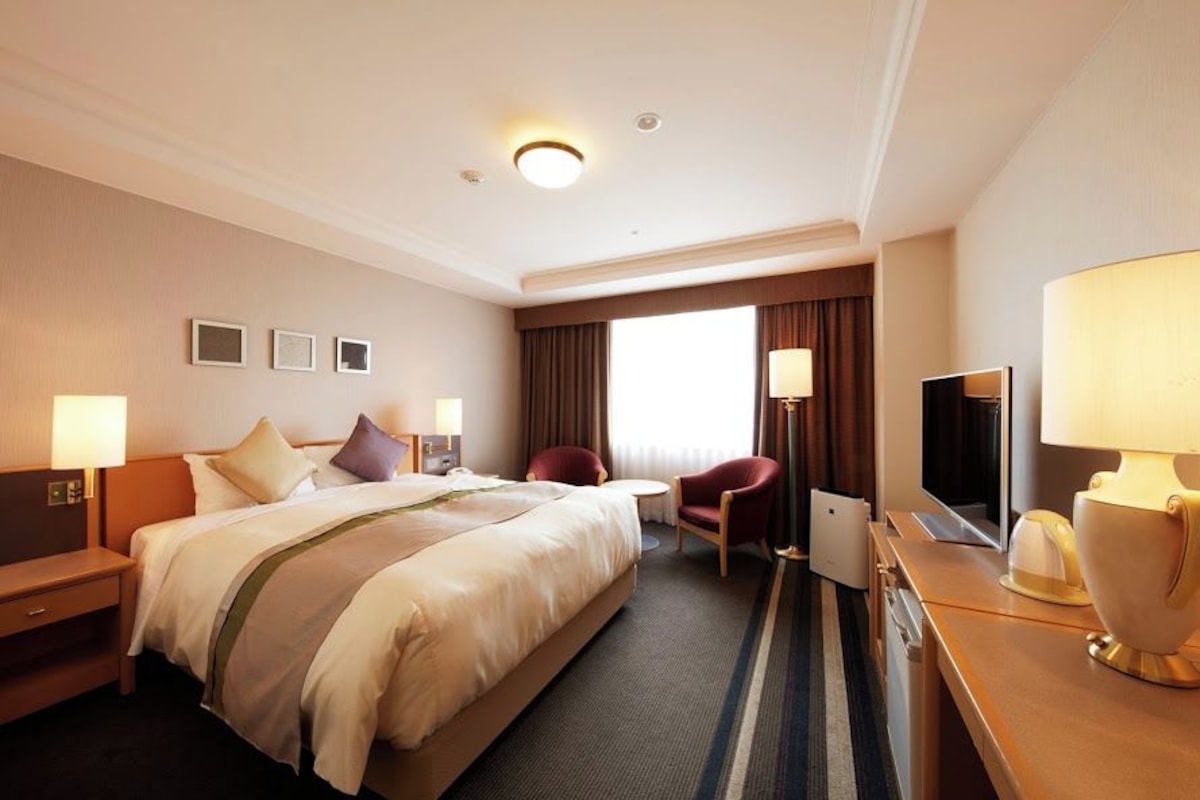 Executive tweepersoonskamer, 1 queensize bed | 1 slaapkamer, een bureau, een laptopwerkplek, verduisterende gordijnen
