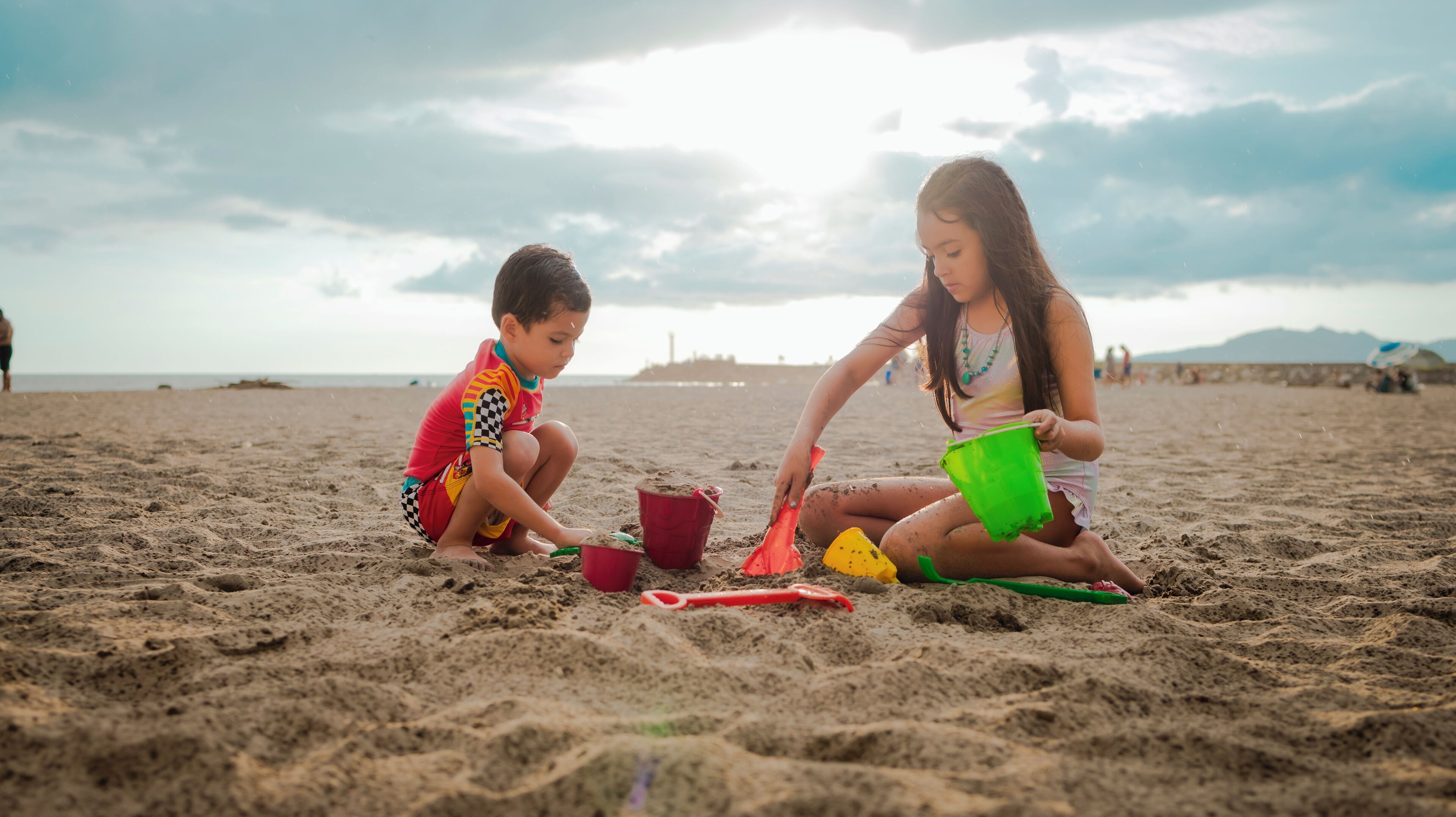 On the beach, sun-loungers, beach umbrellas, beach towels