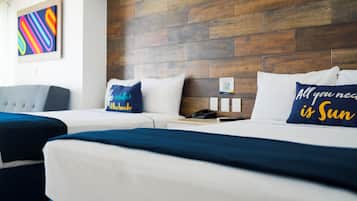 Chambre Junior, balcon, vue mer | 1 chambre, coffres-forts dans les chambres