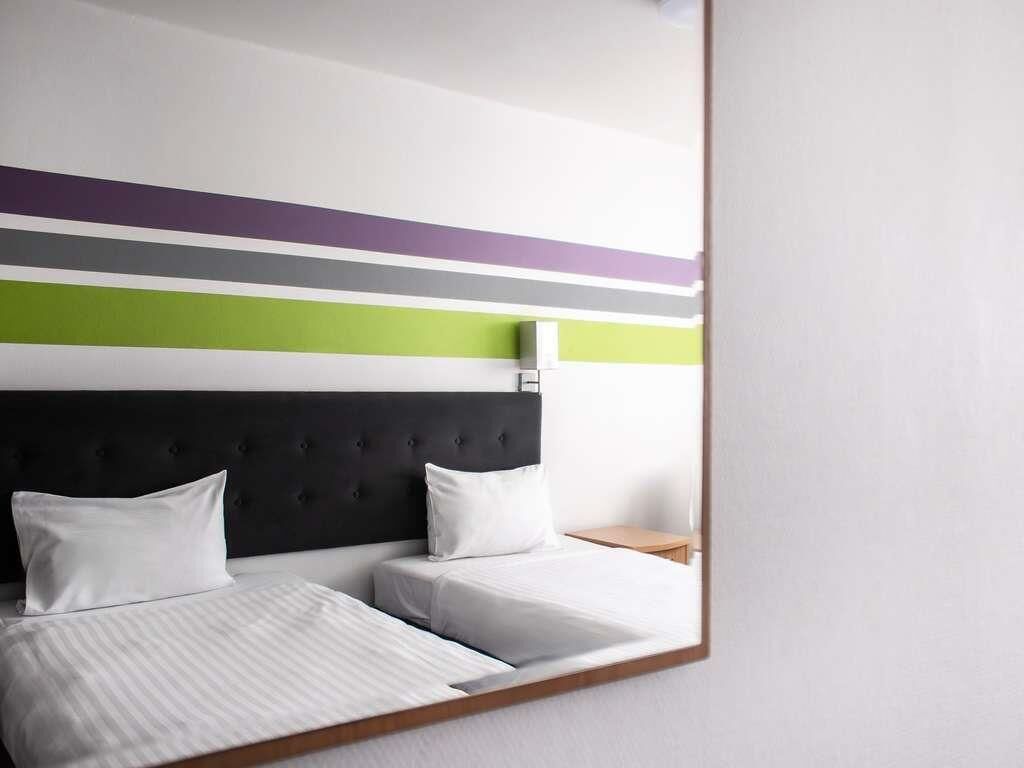 Habitación estándar, 2 camas individuales | 1 habitación y ropa de cama hipoalergénica 