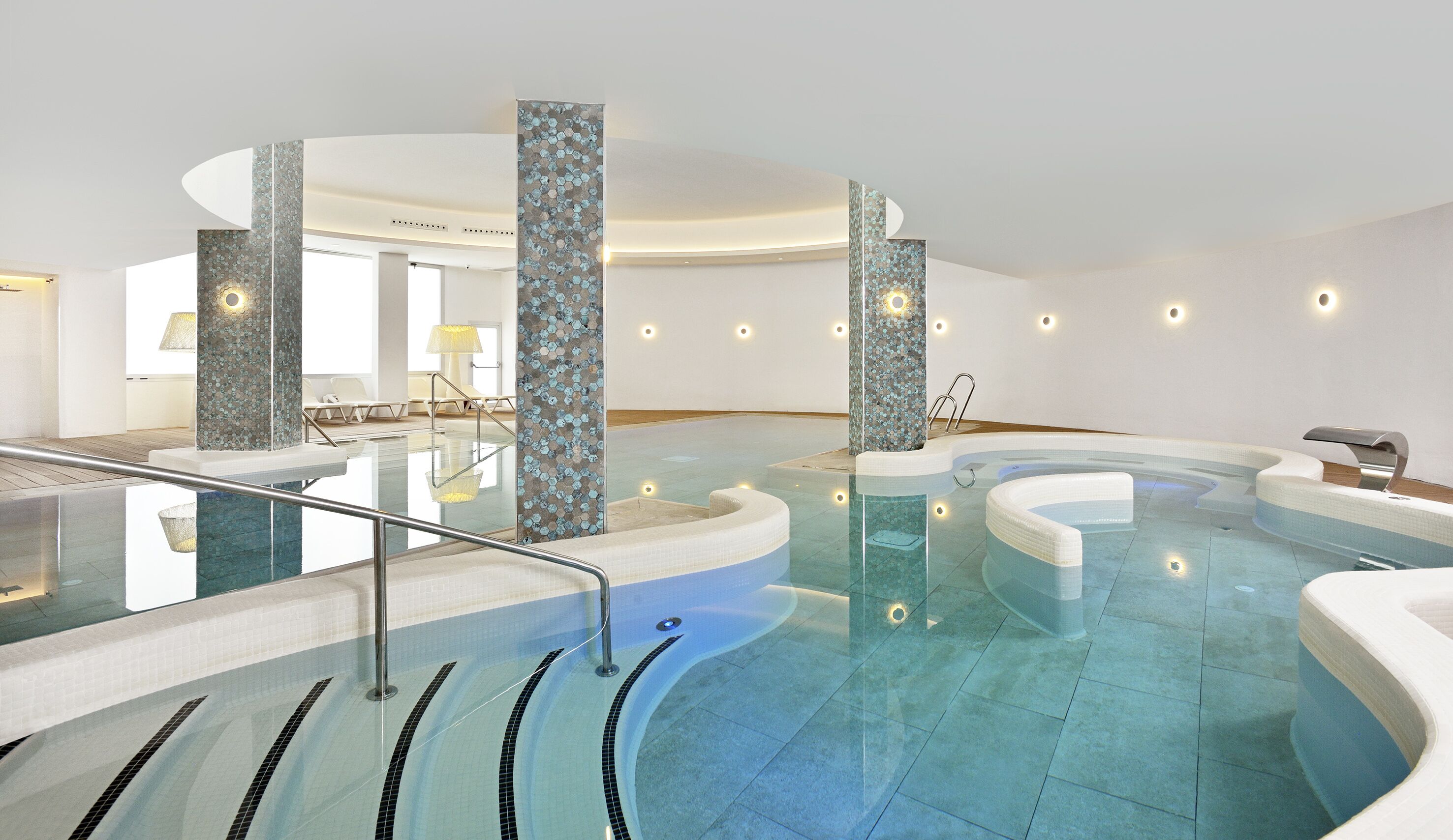 indoor pool, 8 outdoor pools, pool umbrellas, pool loungers