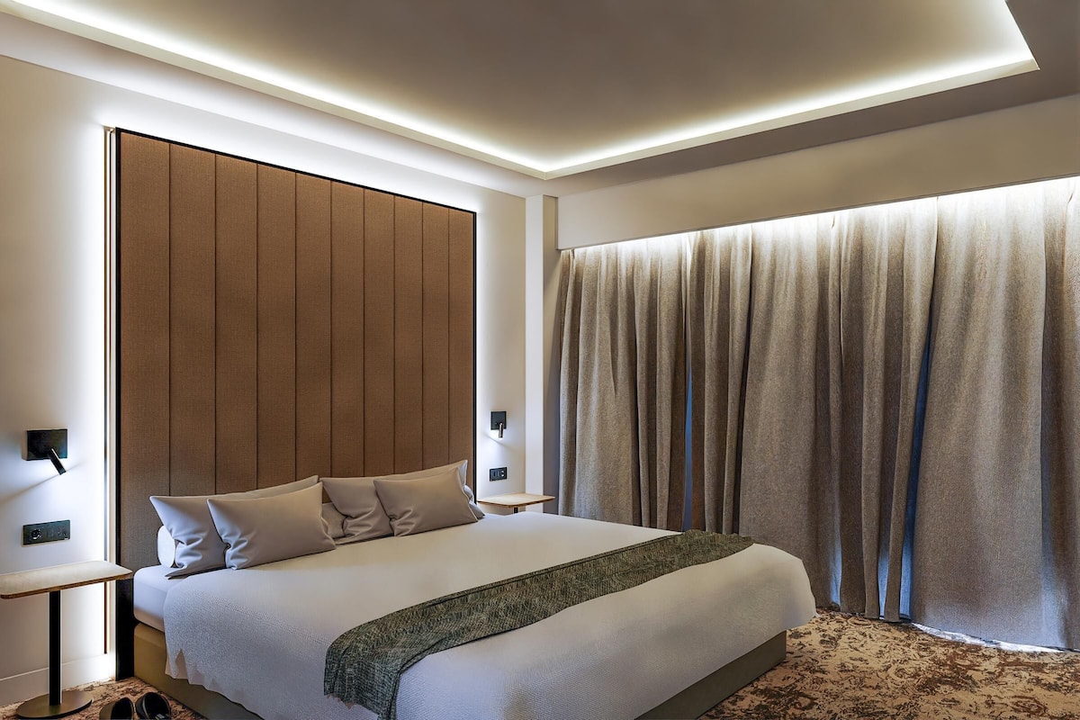 Literie de qualité supérieure, coffres-forts dans les chambres, bureau