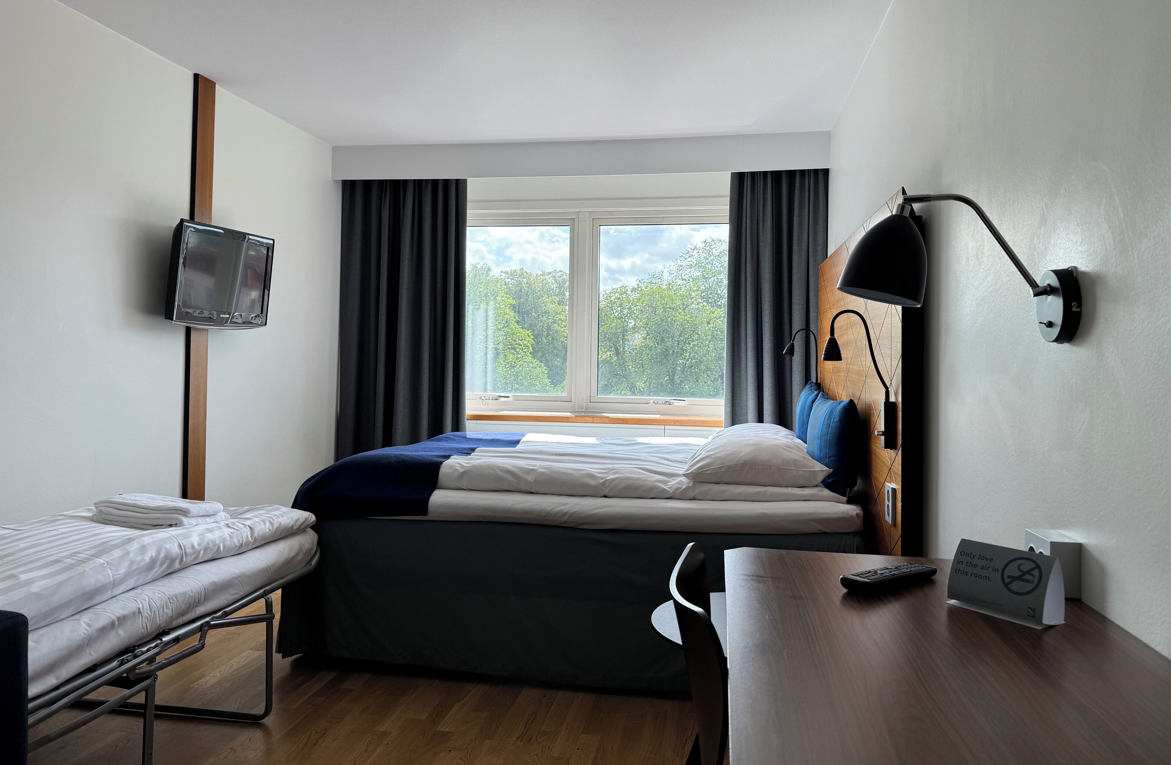 Standard Triple Room | Blackout drapes, cribs/infant beds, rollaway beds, free wired internet