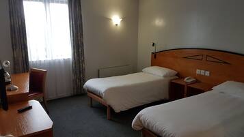 Twin Room, 2 Single Beds | Desk, blackout curtains, iron/ironing board, free WiFi