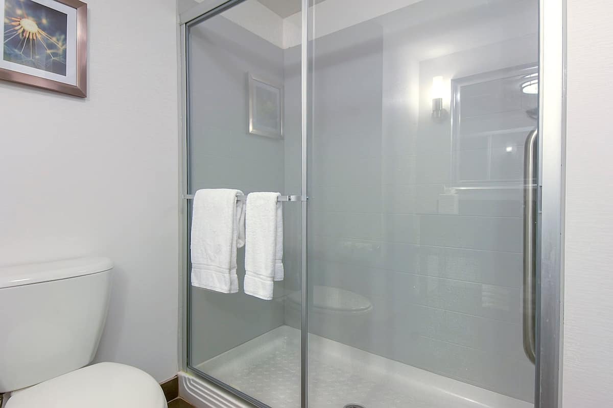 Premium bedding, desk, blackout drapes, iron/ironing board