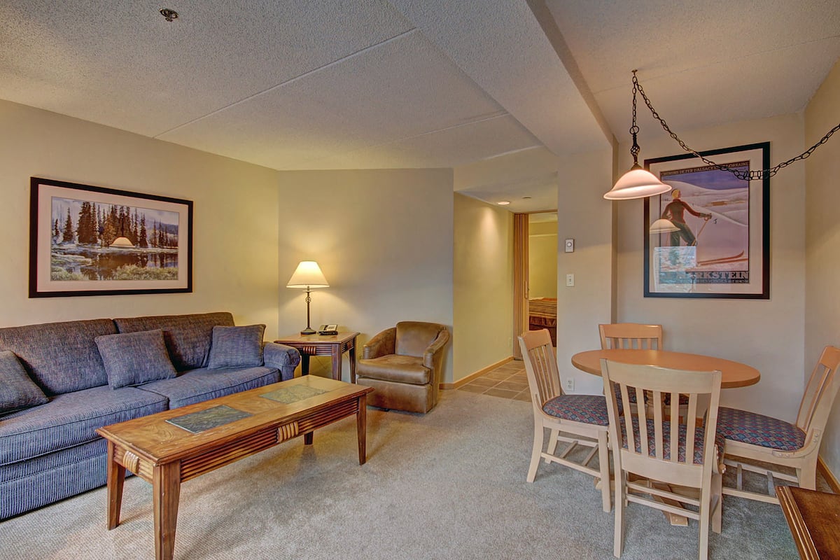 Studio, One Queen and One Sofa Bed | Living area | Flat-screen TV, iPod dock