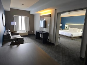 Suite, 1 King Bed, Non Smoking, Kitchenette | Pillowtop beds, blackout drapes, iron/ironing board