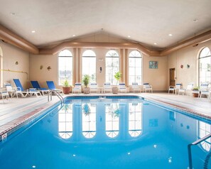 Indoor pool, open 6:00 AM to 10:00 PM, pool loungers