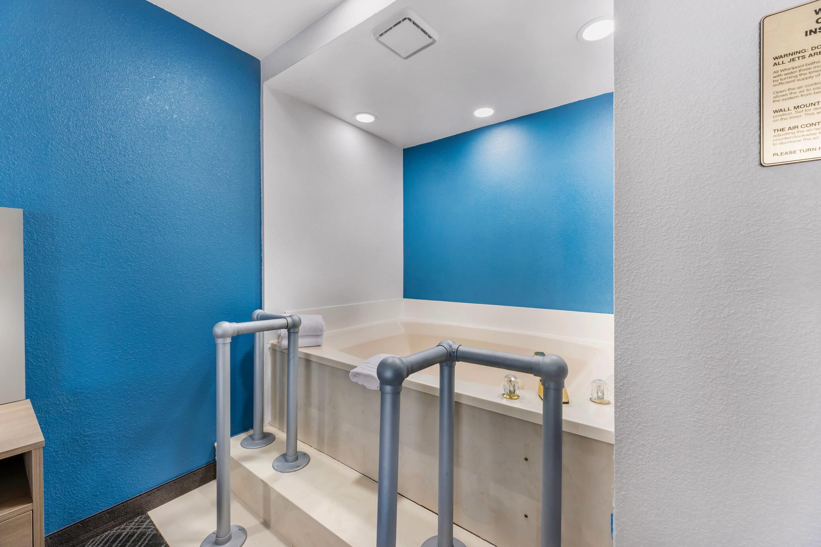 pillow-top beds, blackout curtains, iron/ironing board