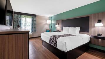 Hypo-allergenic bedding, desk, blackout drapes, iron/ironing board