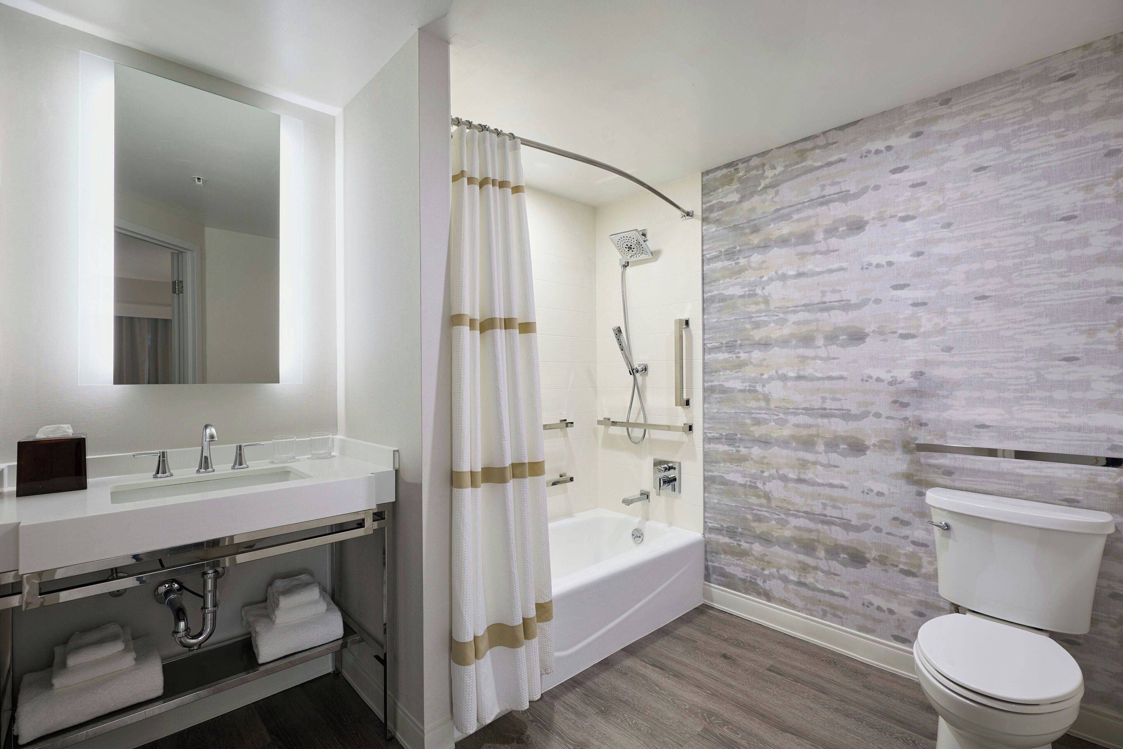 combined shower/bathtub, free toiletries, hair dryer, towels