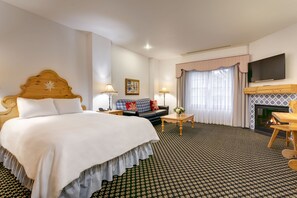 Ropa de cama hipoalergénica y caja de seguridad en la habitación 