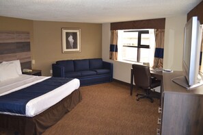 Een bureau, verduisterende gordijnen, gratis wifi, beddengoed