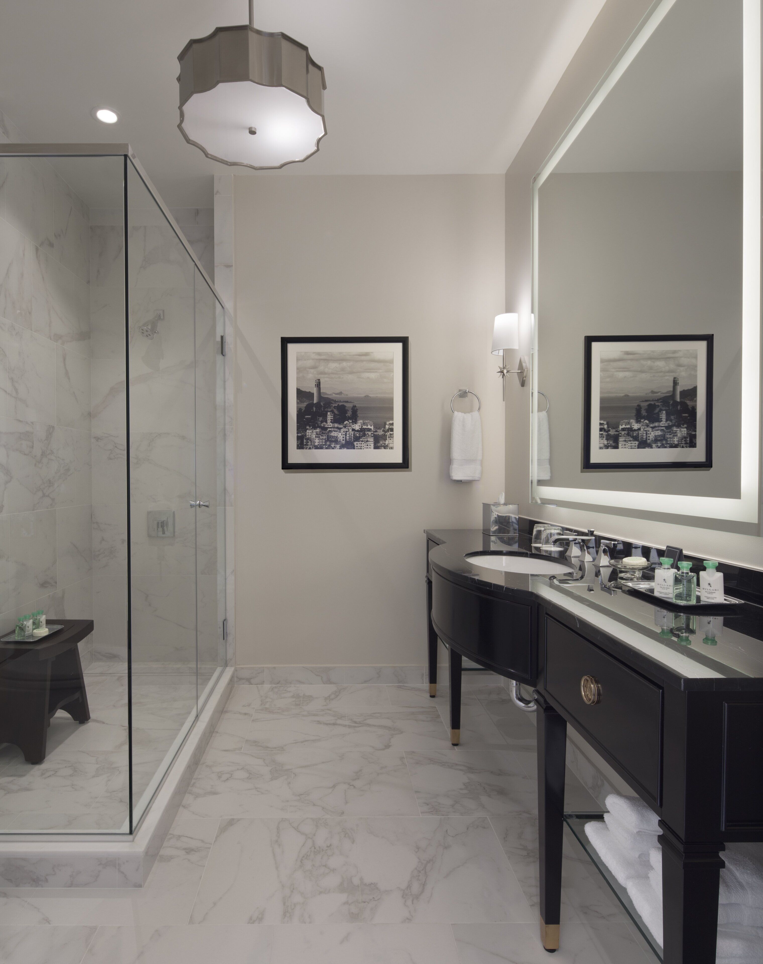 designer toiletries, hair dryer, bathrobes, slippers