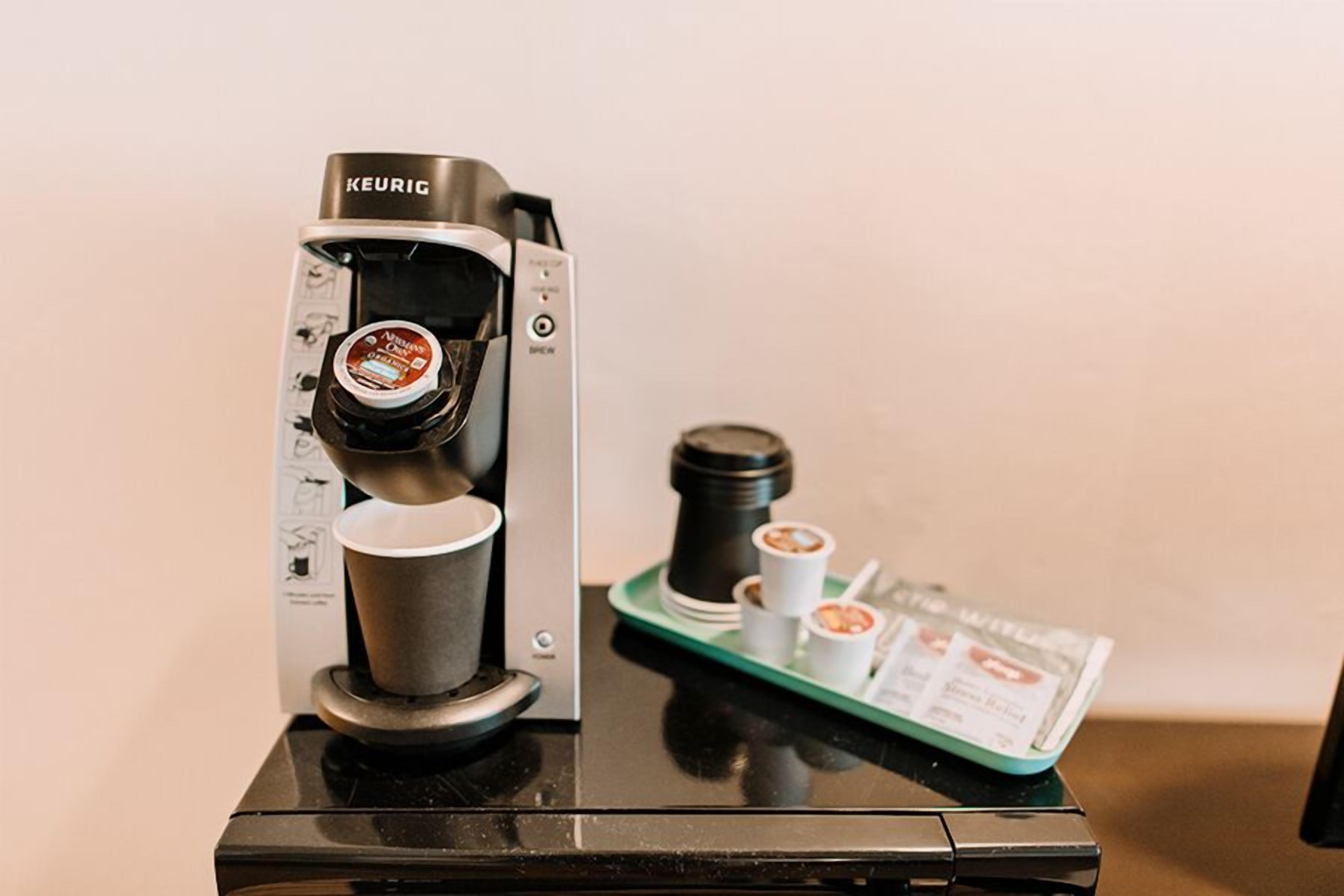 hypo-allergenic bedding, laptop workspace, blackout curtains