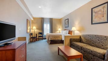 Suite, 1 King Bed with Sofa bed, Non Smoking, Kitchen (2 Person Sofa bed) | Iron/ironing board, rollaway beds, free WiFi, bed sheets