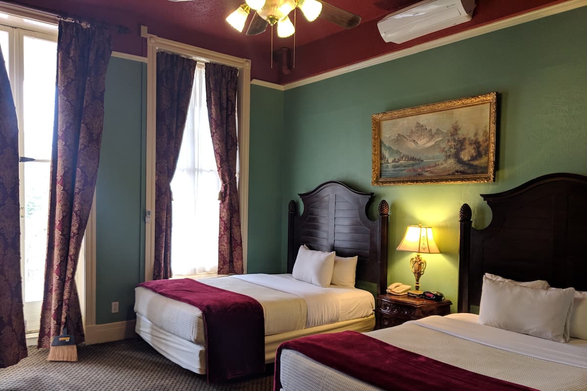 Premium Double Room, 2 Queen Beds, Resort View | Iron/ironing board, free cribs/infant beds, rollaway beds, WiFi
