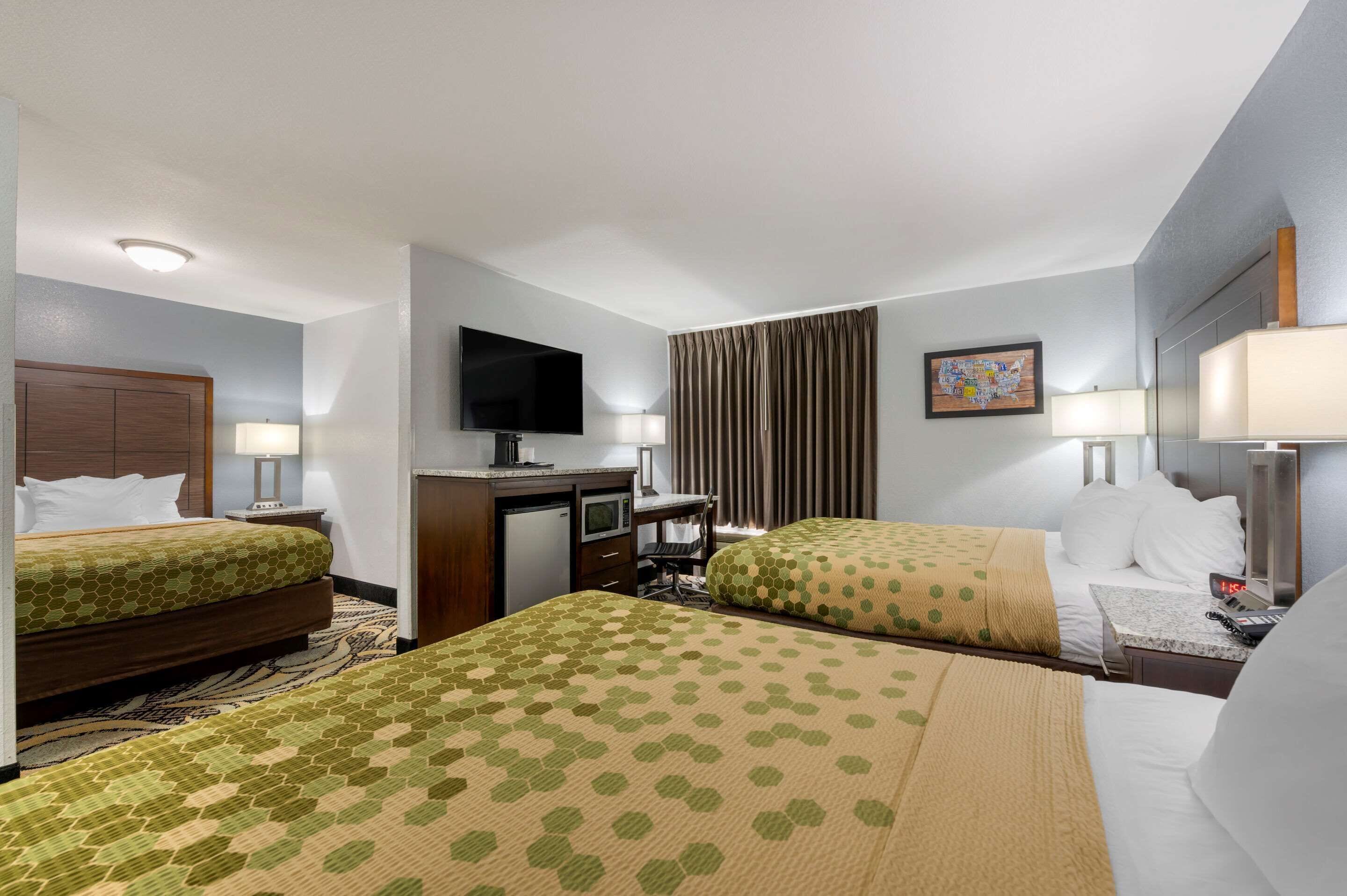 desk, blackout curtains, iron/ironing board, free cots/infant beds