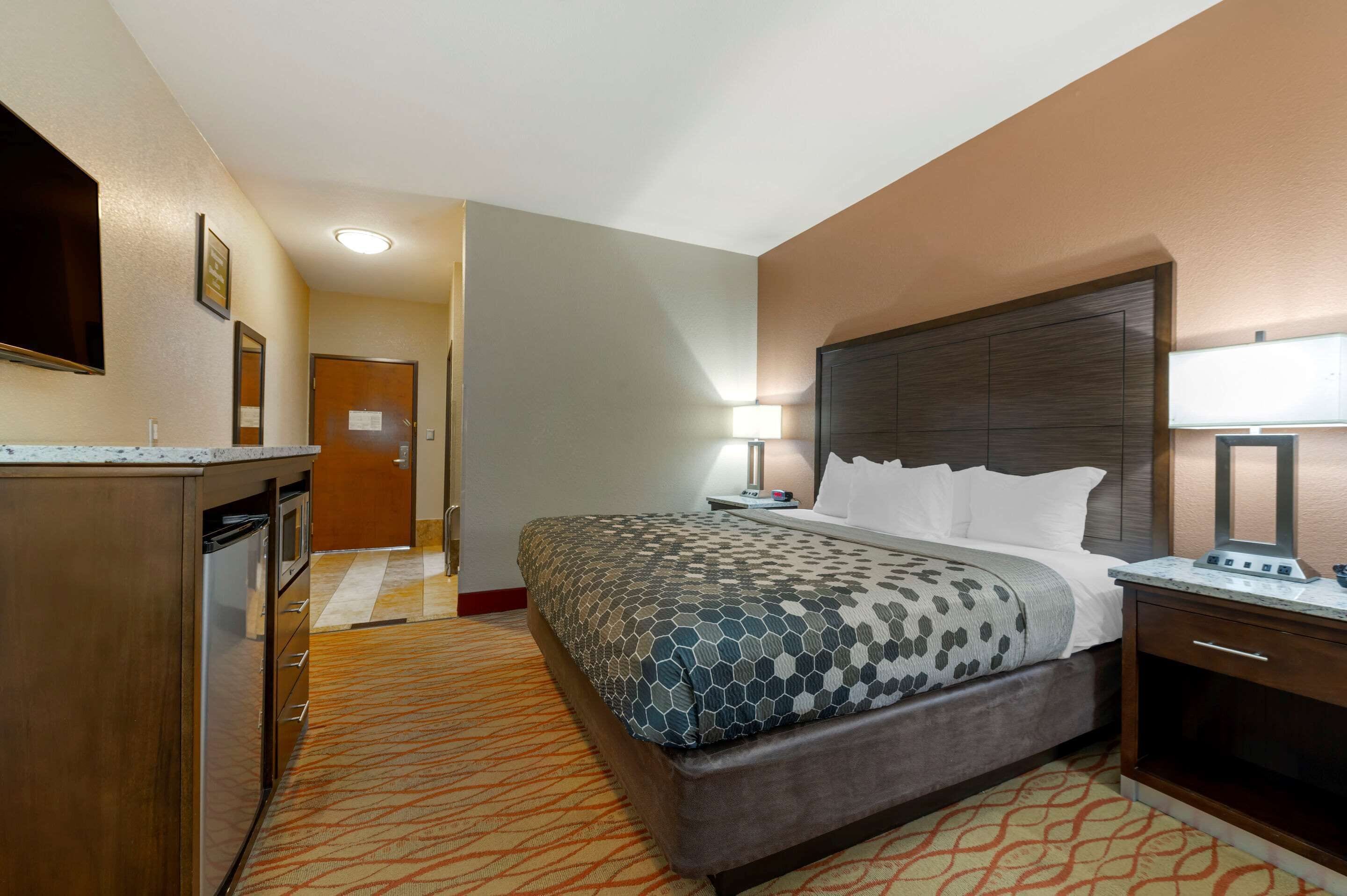 desk, blackout curtains, iron/ironing board, free cots/infant beds