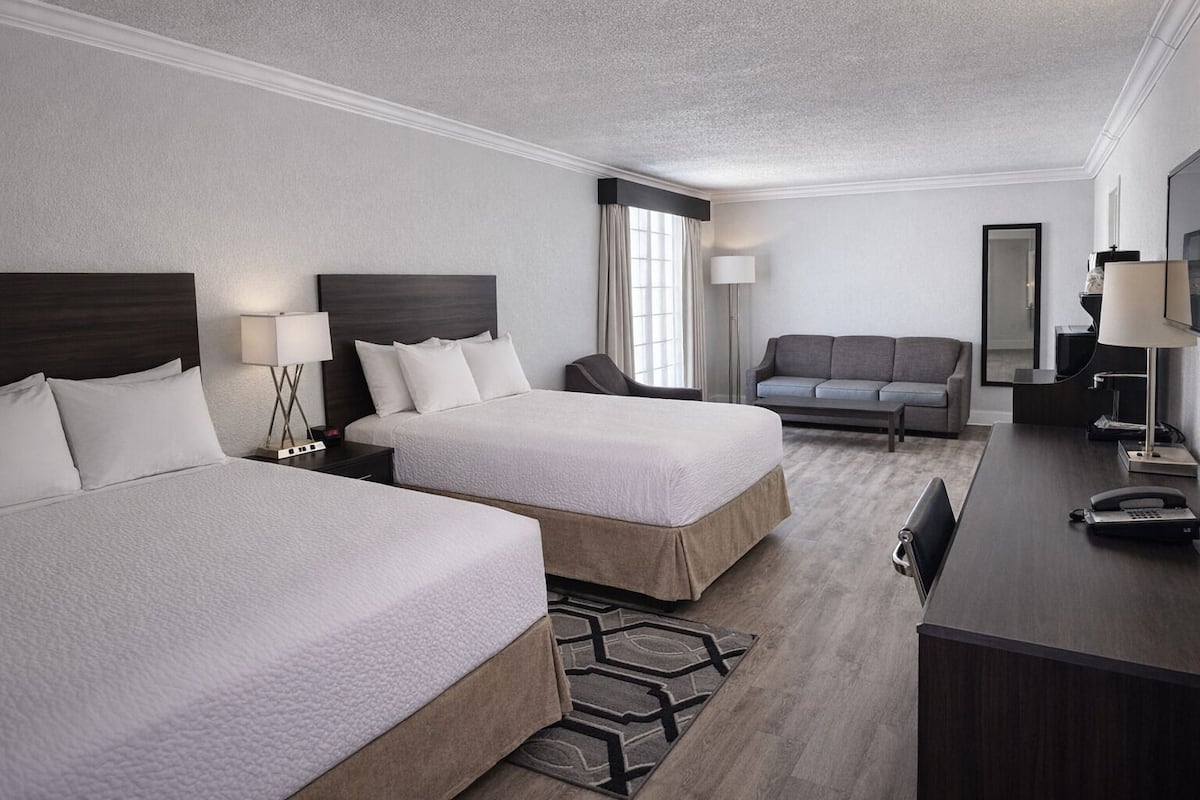 Suite, Multiple Beds, Non Smoking | In-room safe, desk, blackout drapes, iron/ironing board