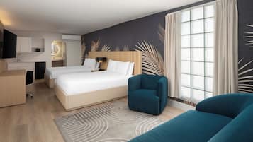 Suite estudio Premium, varias camas, no fumadores | 1 dormitorio, caja fuerte, escritorio y cortinas opacas