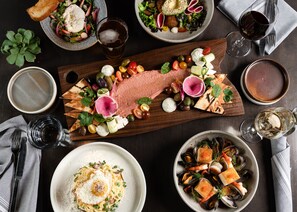 Breakfast, lunch, dinner served; local cuisine 