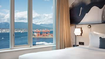 Suite, 1 cama King size y sofá cama, vista al puerto | Vista a la montaña