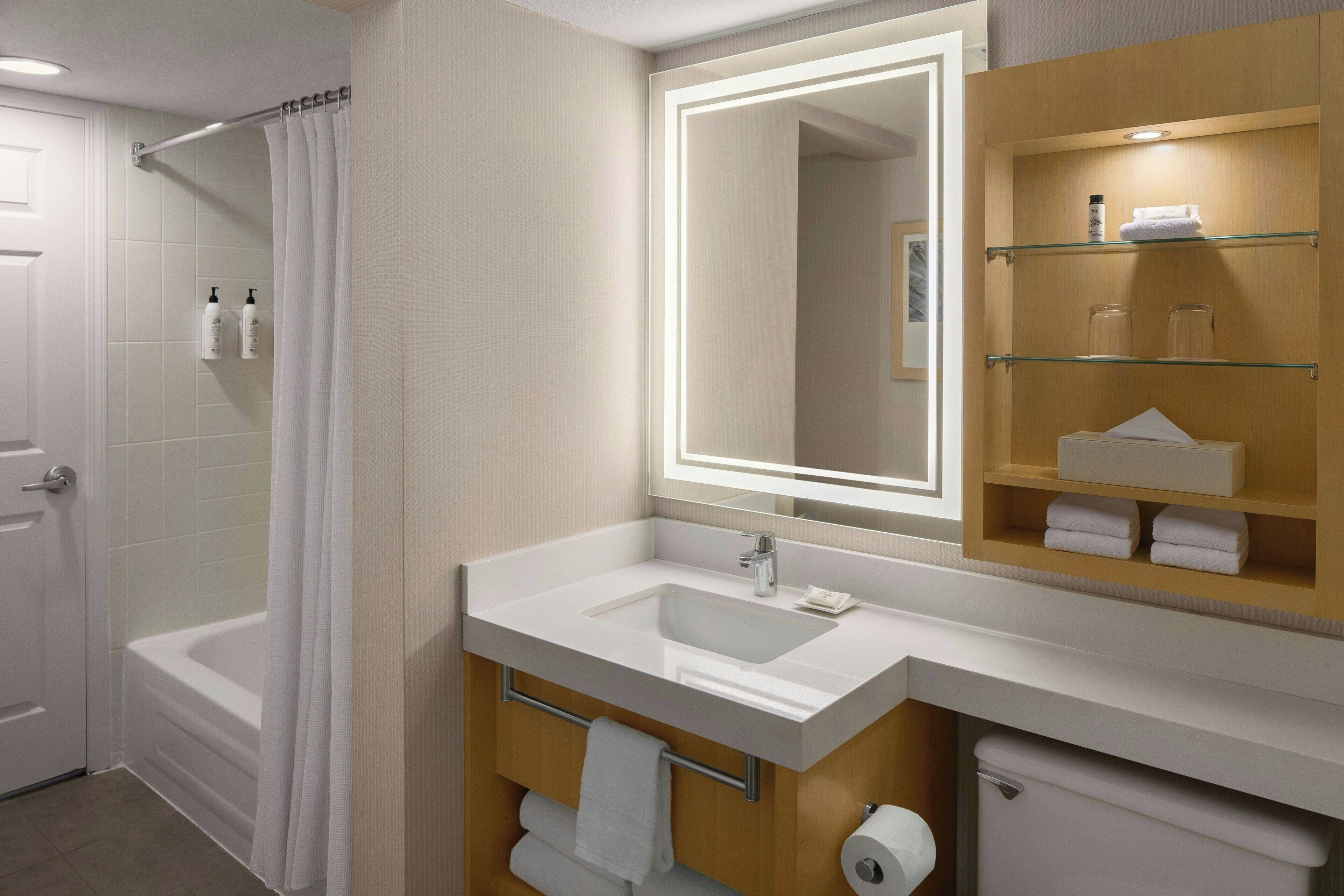 combined shower/bathtub, free toiletries, hair dryer, bathrobes