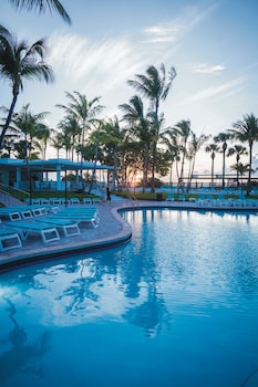Outdoor pool, sun loungers at Hotel Riu Plaza Miami Beach