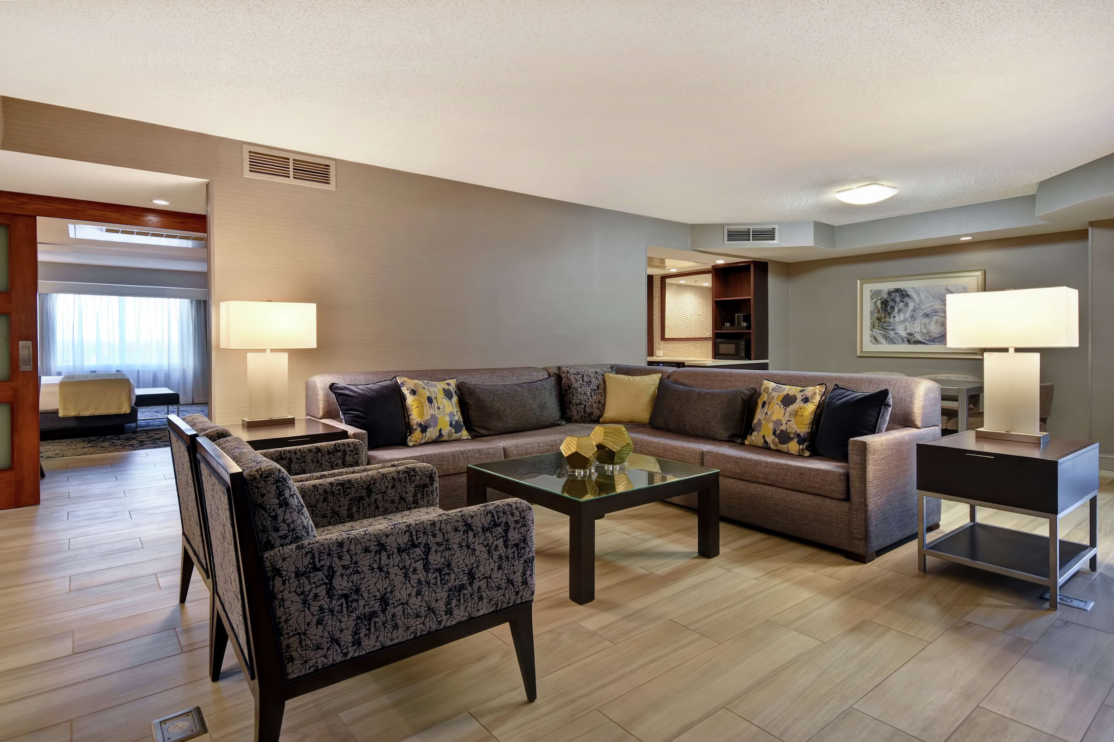 presidential suite, 1 king bed (mobility & hearing) | living area | 49-inch flat-screen tv with cable channels, smart tv, netflix