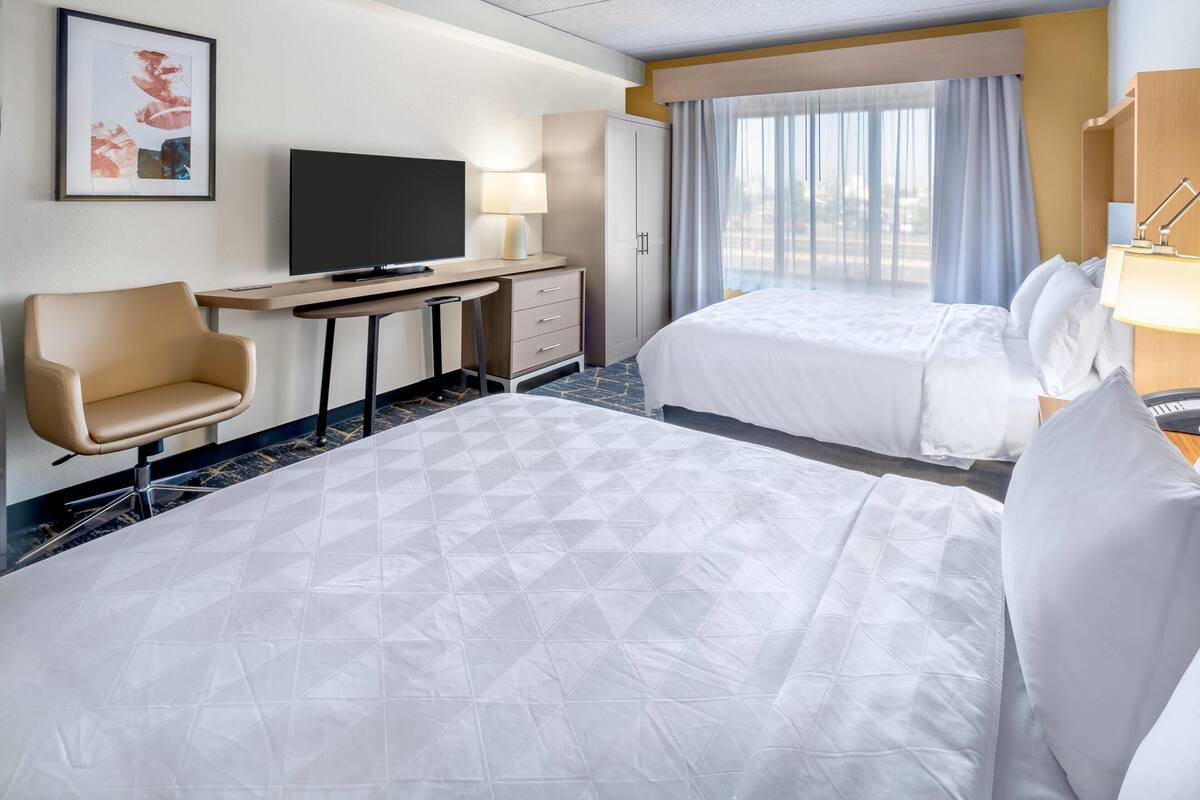 Premium bedding, down comforters, pillowtop beds, desk