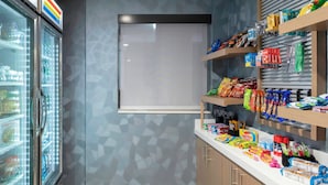 A snack bar with a variety of packaged foods and beverages. - Holiday Inn Express & Suites Kimball by IHG (South Pittsburg)
