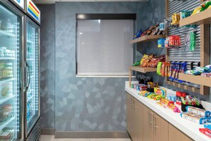 A snack bar with a variety of packaged foods and beverages. - Holiday Inn Express & Suites Kimball by IHG (South Pittsburg)