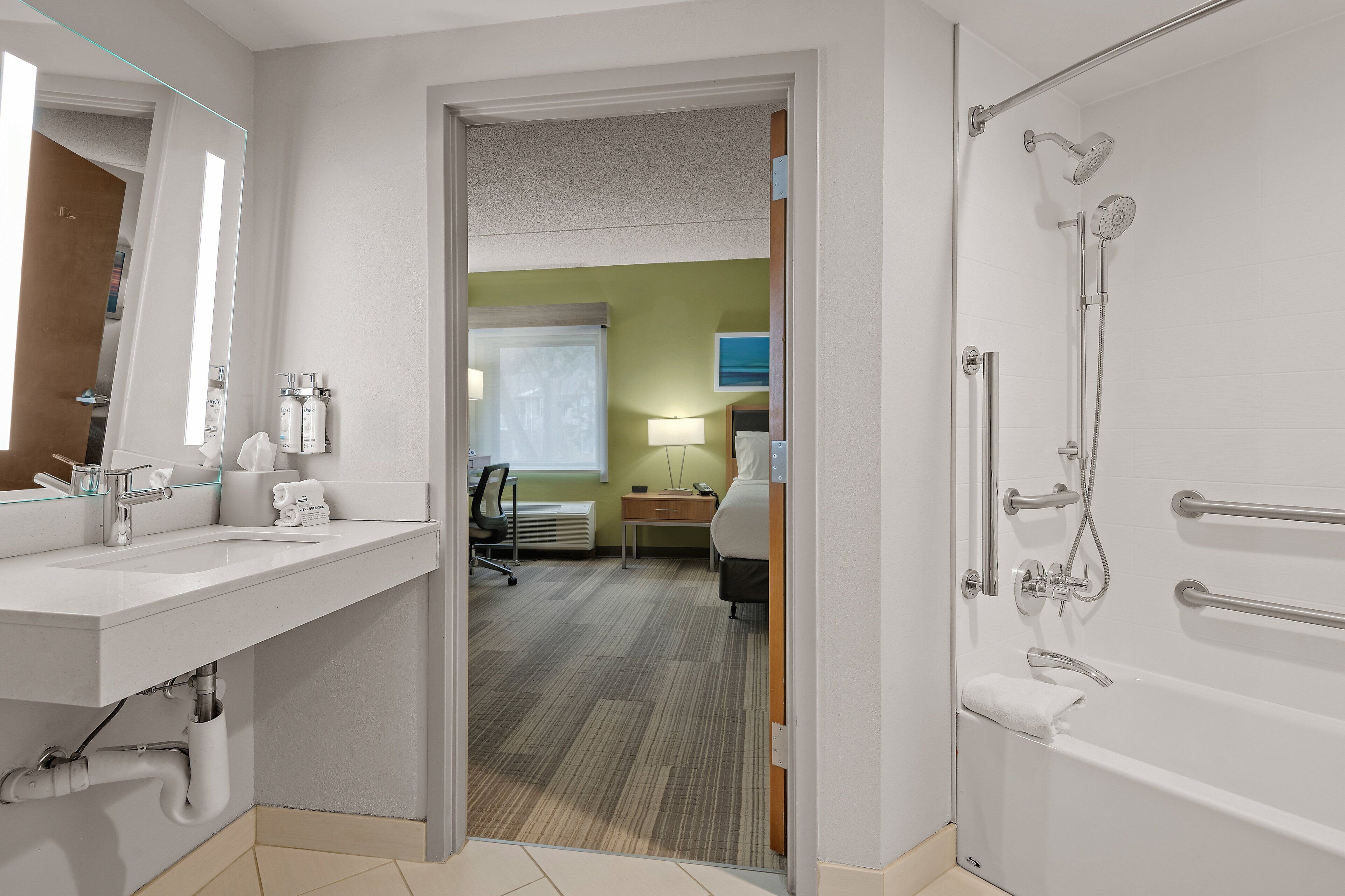 room, 1 queen bed with sofa bed, accessible bathtub (accessible tub) | bathroom | designer toiletries, hair dryer, towels, soap