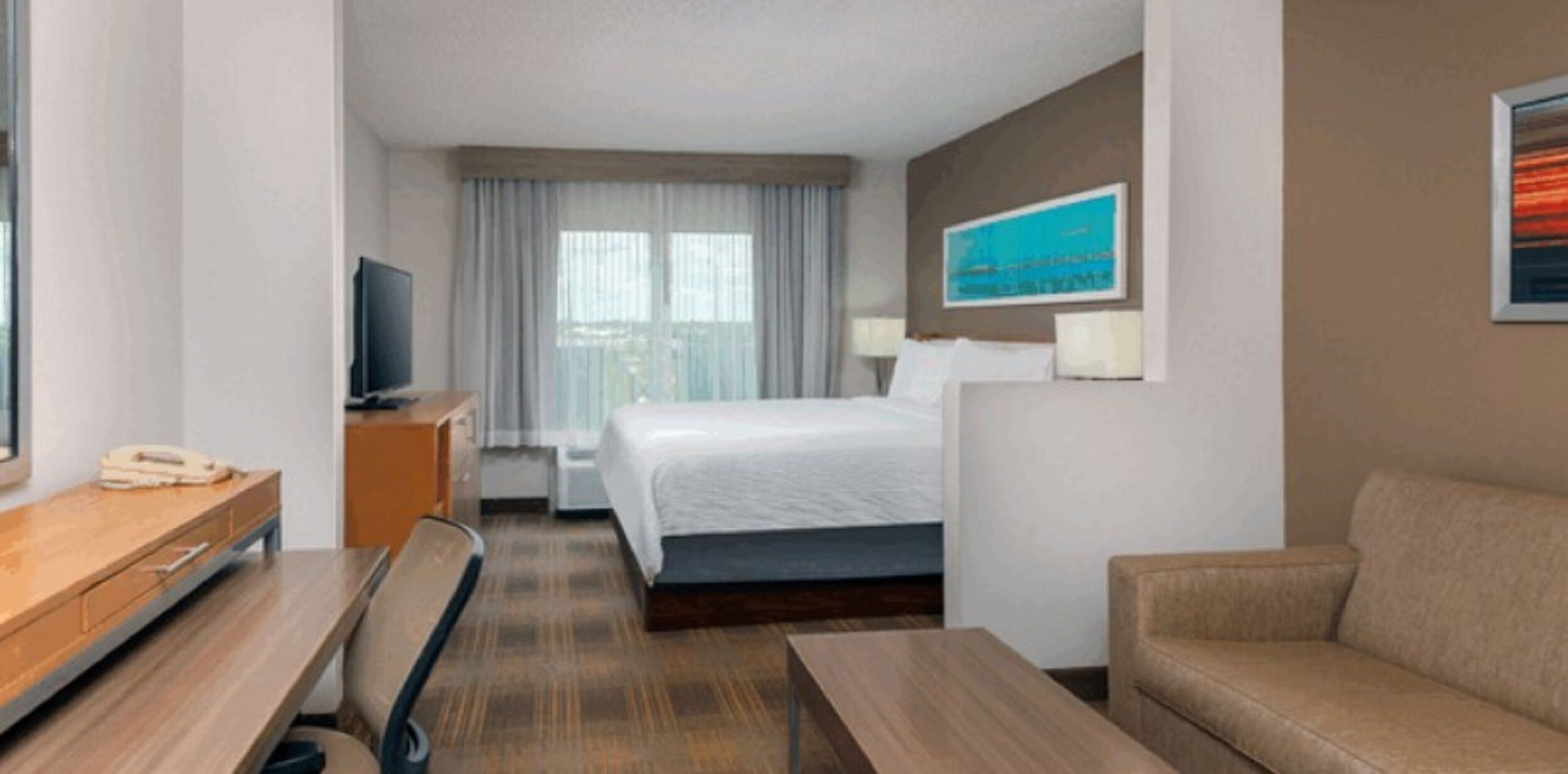Premium bedding, down duvets, in-room safe, desk