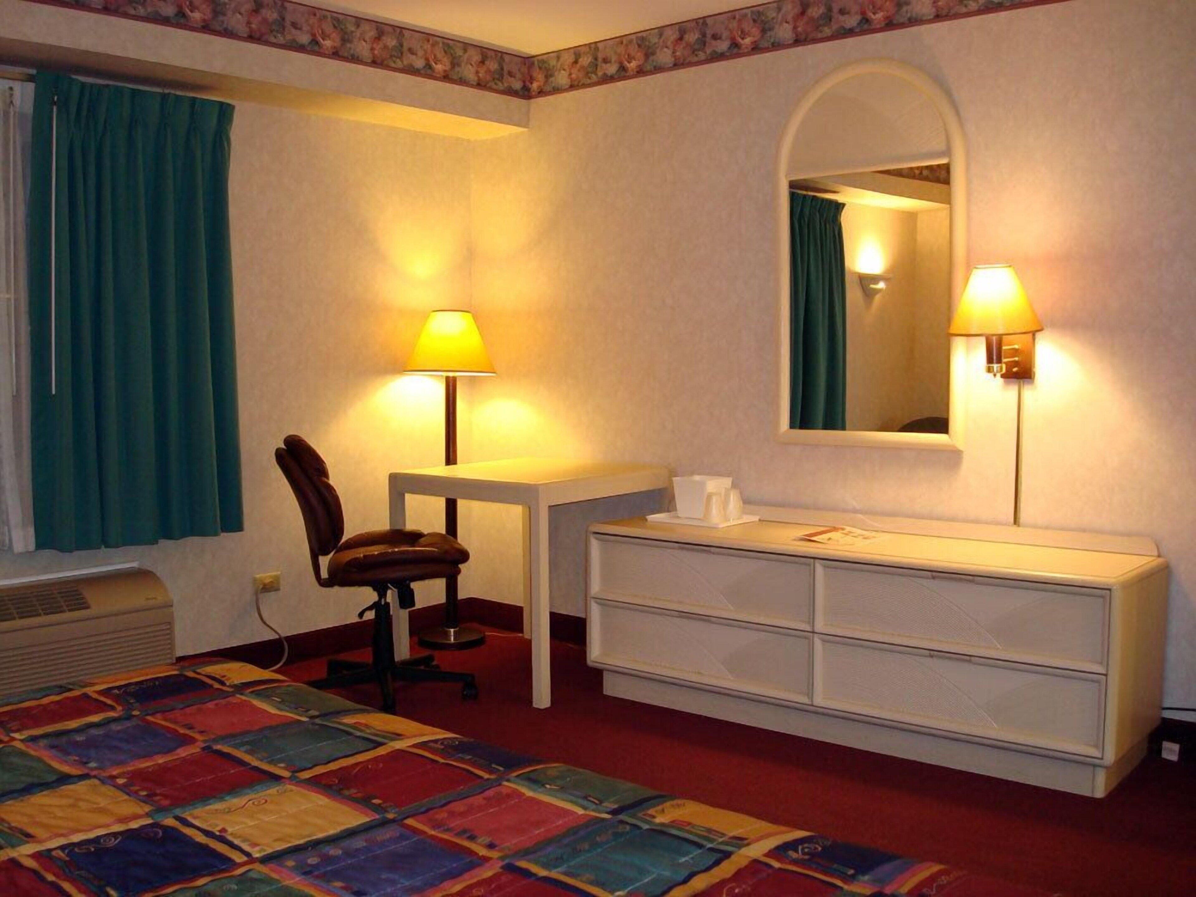 Desk, blackout drapes, iron/ironing board, free WiFi