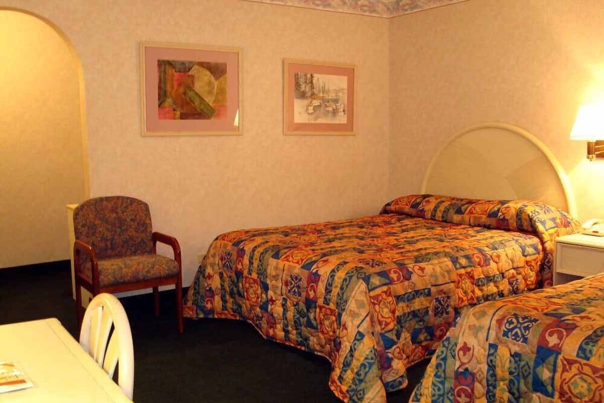 double room, 2 queen beds | desk, blackout curtains, iron/ironing board, free wifi