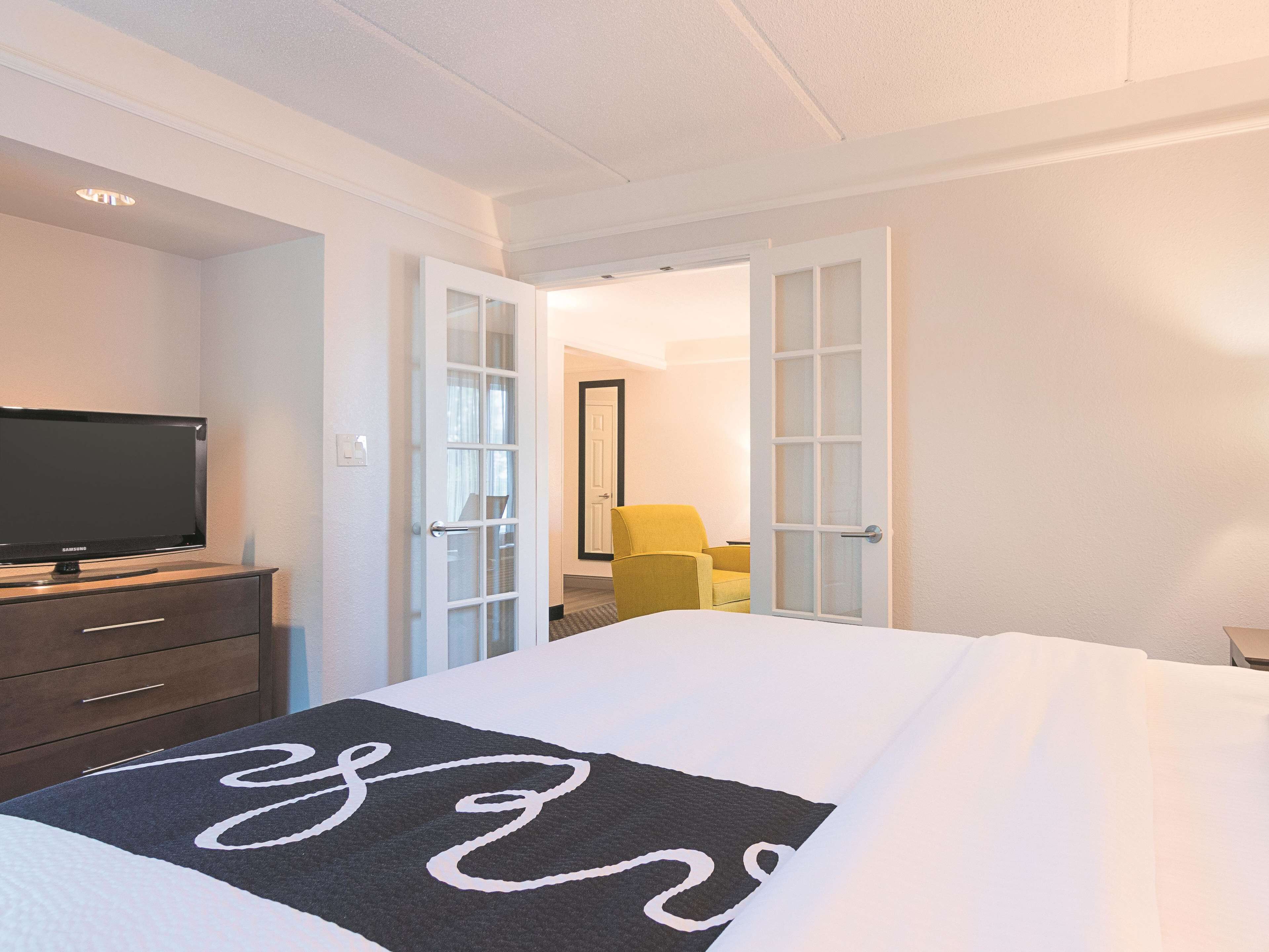 suite, 1 king bed, non smoking | premium bedding, desk, laptop workspace, iron/ironing board