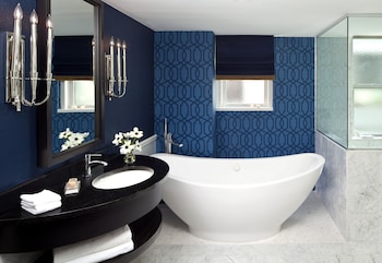 Combined shower/tub, designer toiletries, hair dryer, bathrobes at Kimpton George Hotel, an IHG Hotel