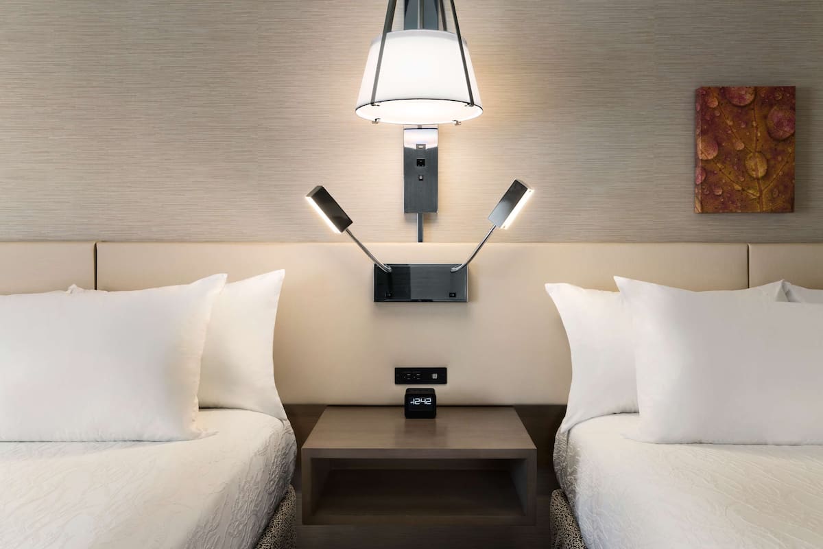 premium bedding, desk, laptop workspace, blackout curtains