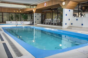 Indoor pool, open 6:00 AM to 11:00 PM, sun loungers