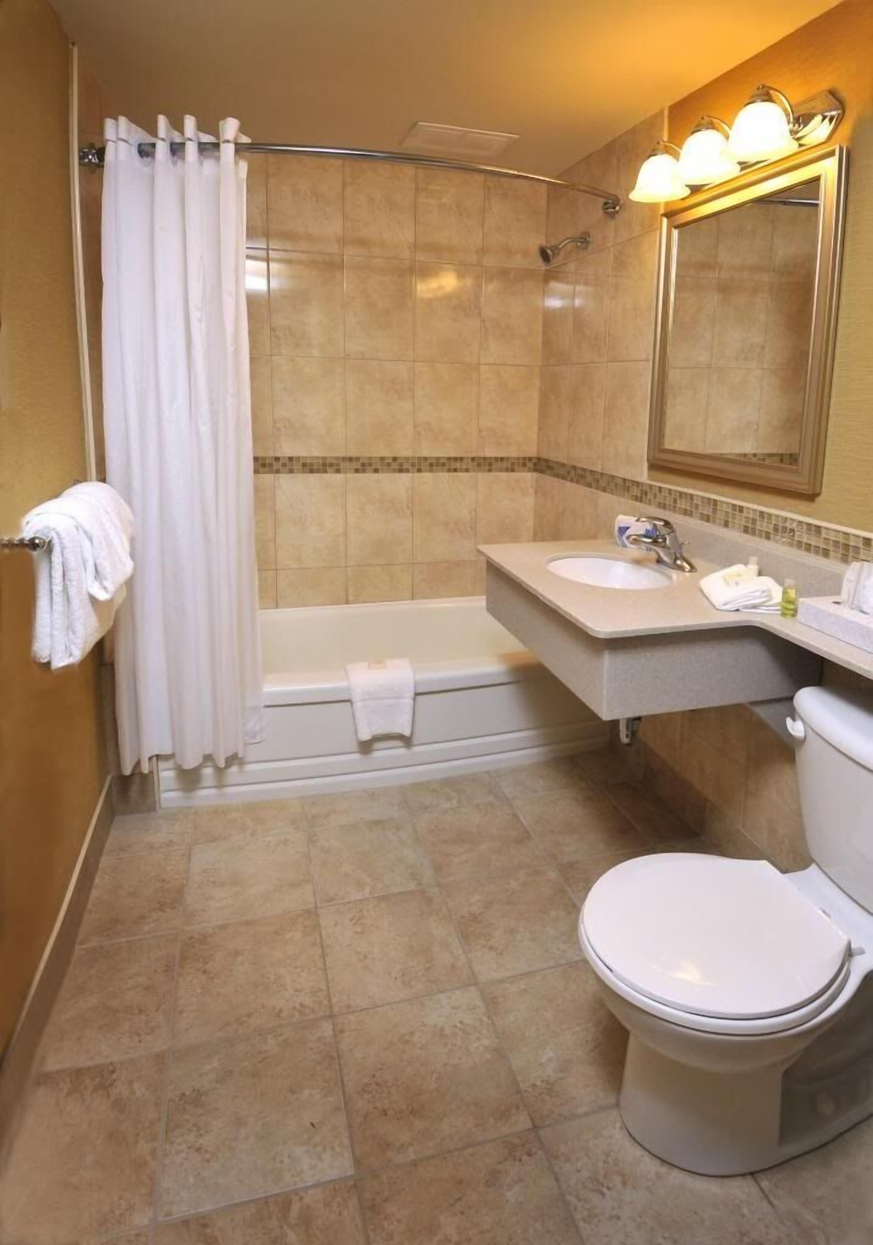 select plus king room | bathroom | shower, eco-friendly toiletries, hair dryer, towels