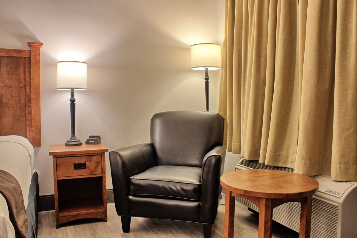 select plus king room | premium bedding, pillow-top beds, desk, blackout curtains