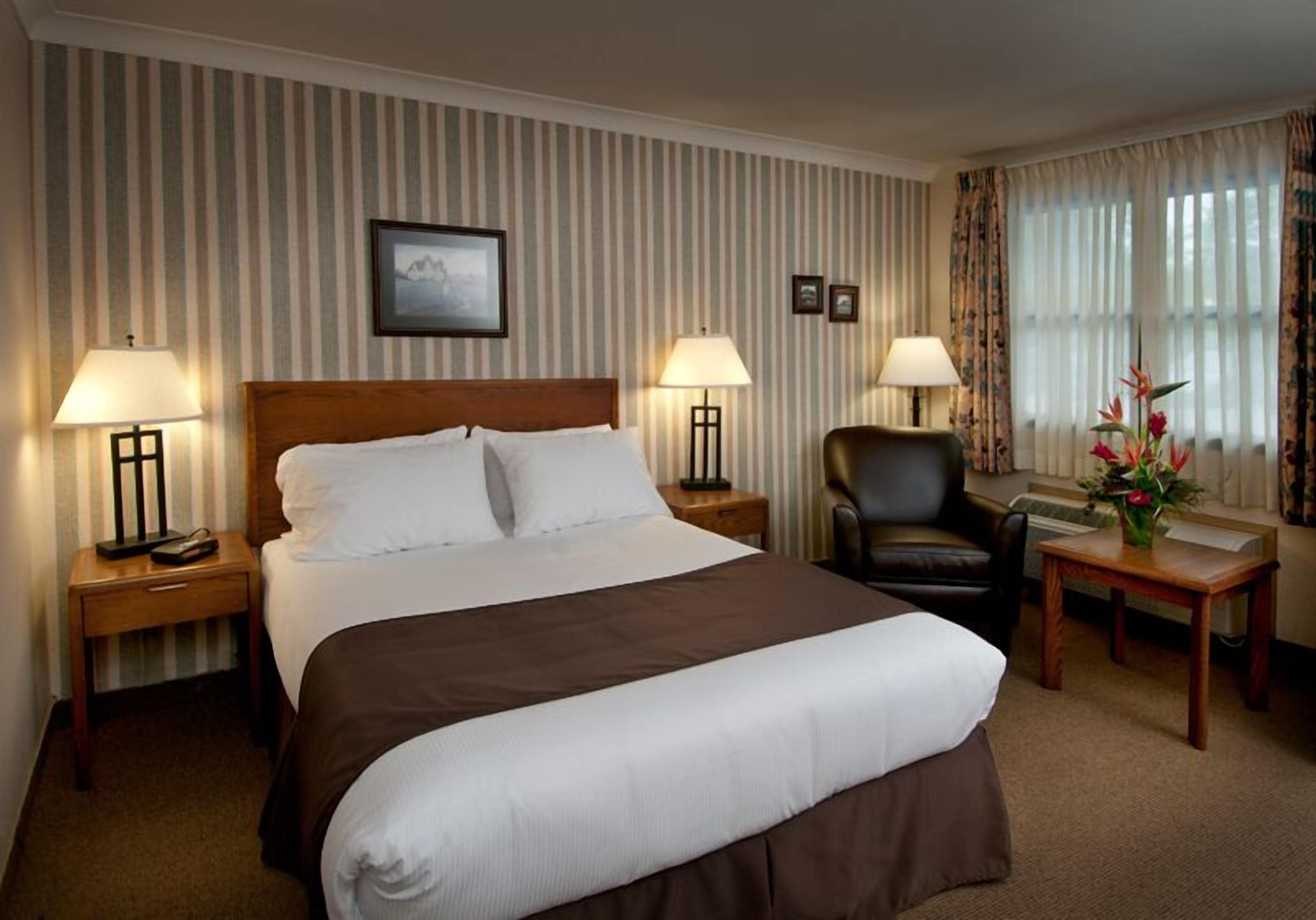 select queen room | premium bedding, pillow-top beds, desk, blackout curtains