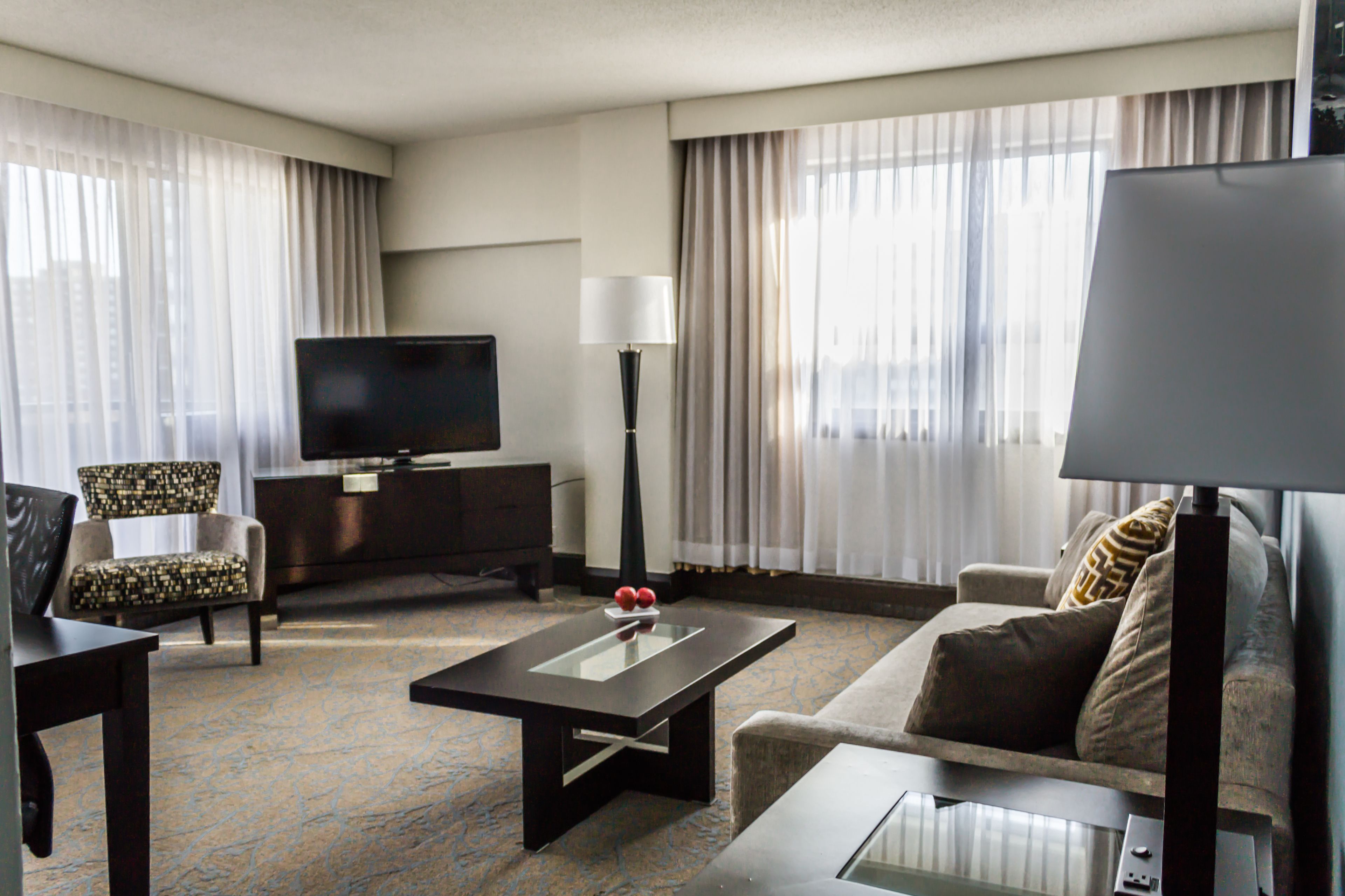 one bedroom suite 2 queen bed | living area | 37-inch flat-screen tv with cable/satellite tv channels, tv