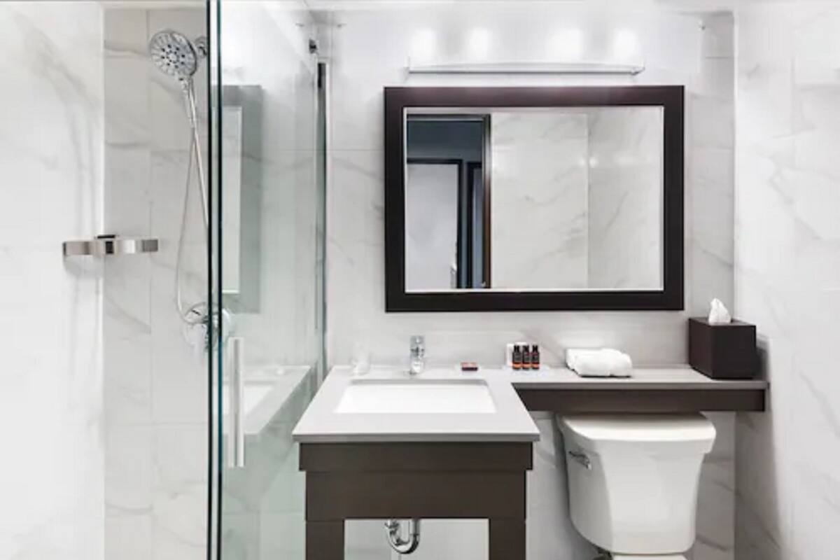 eco-friendly toiletries, hair dryer, towels