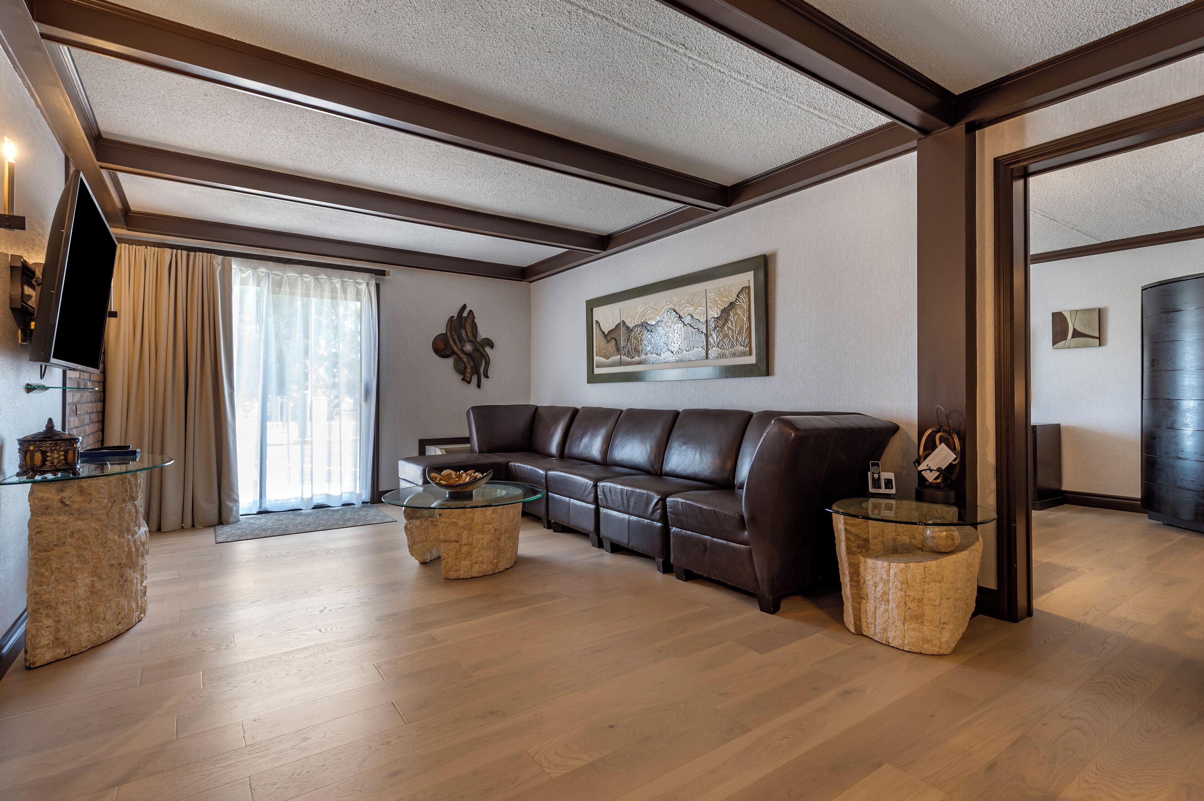 suite, 1 king bed, non smoking, refrigerator | living area | 42-inch tv with satellite channels, first-run films, mp3 dock