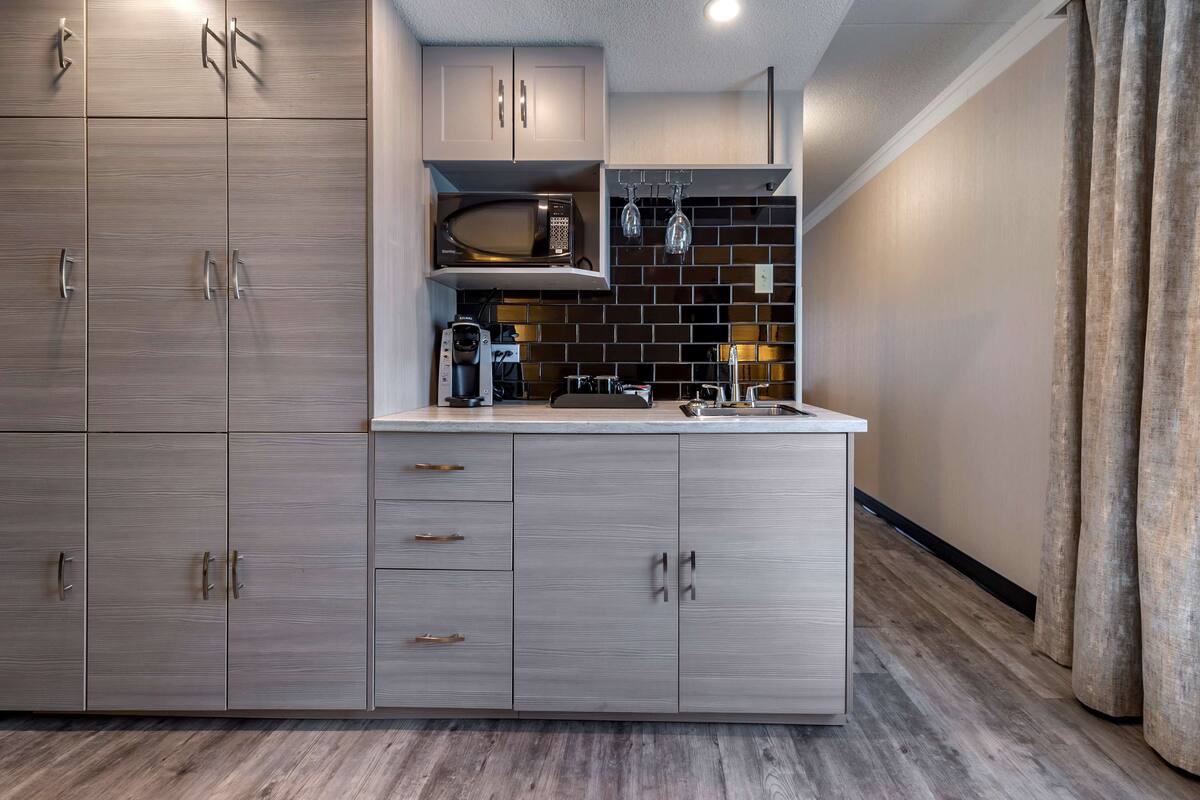 memory-foam beds, desk, laptop workspace, blackout curtains